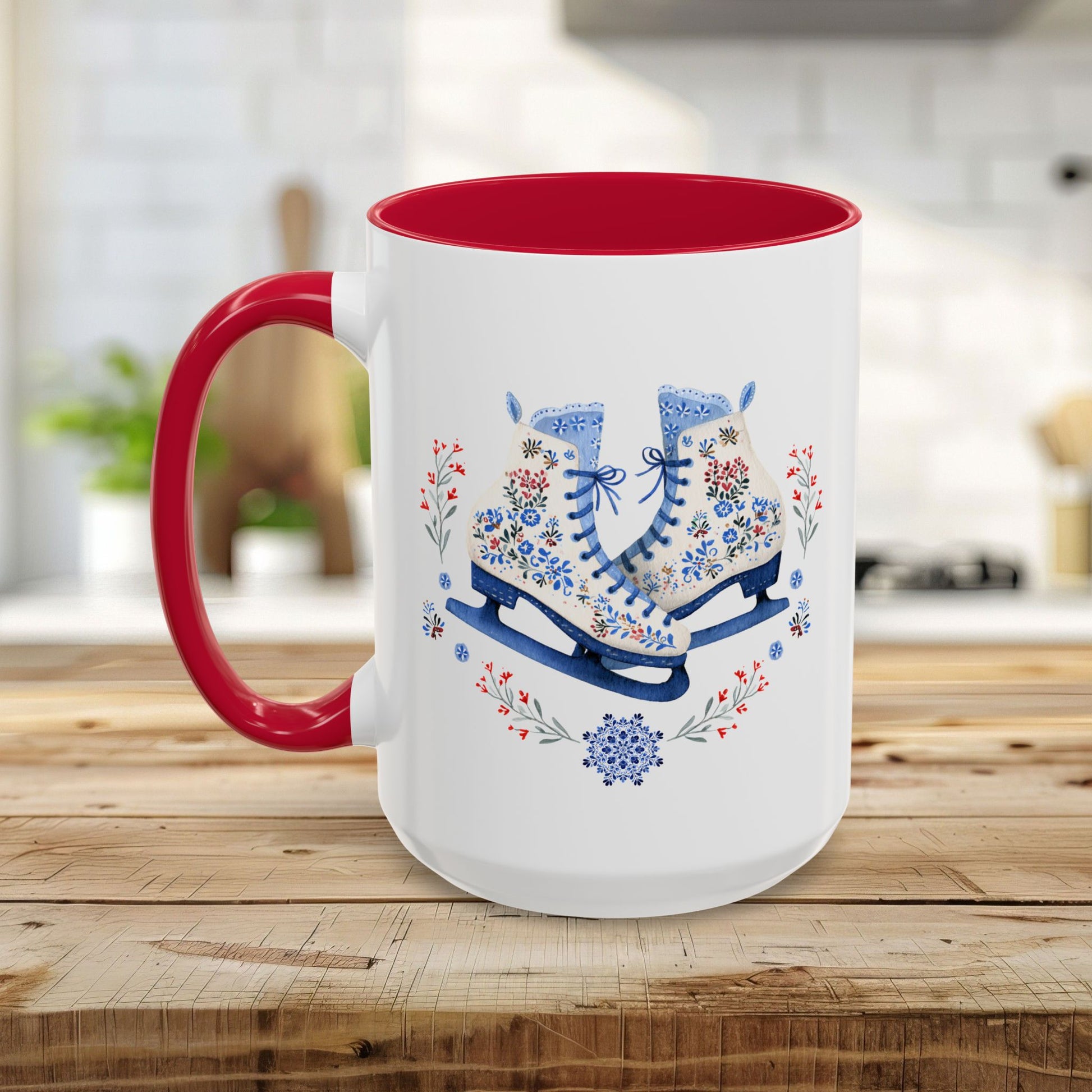 White ceramic mug with red handle and interior, featuring folk art ice skates, snowflakes, and winter berries.