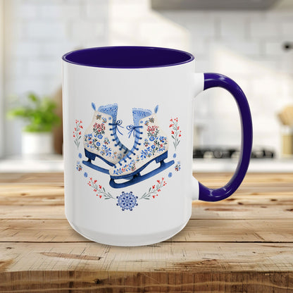 White ceramic mug with a purple handle and interior, featuring folk art ice skates, snowflakes, and berries.