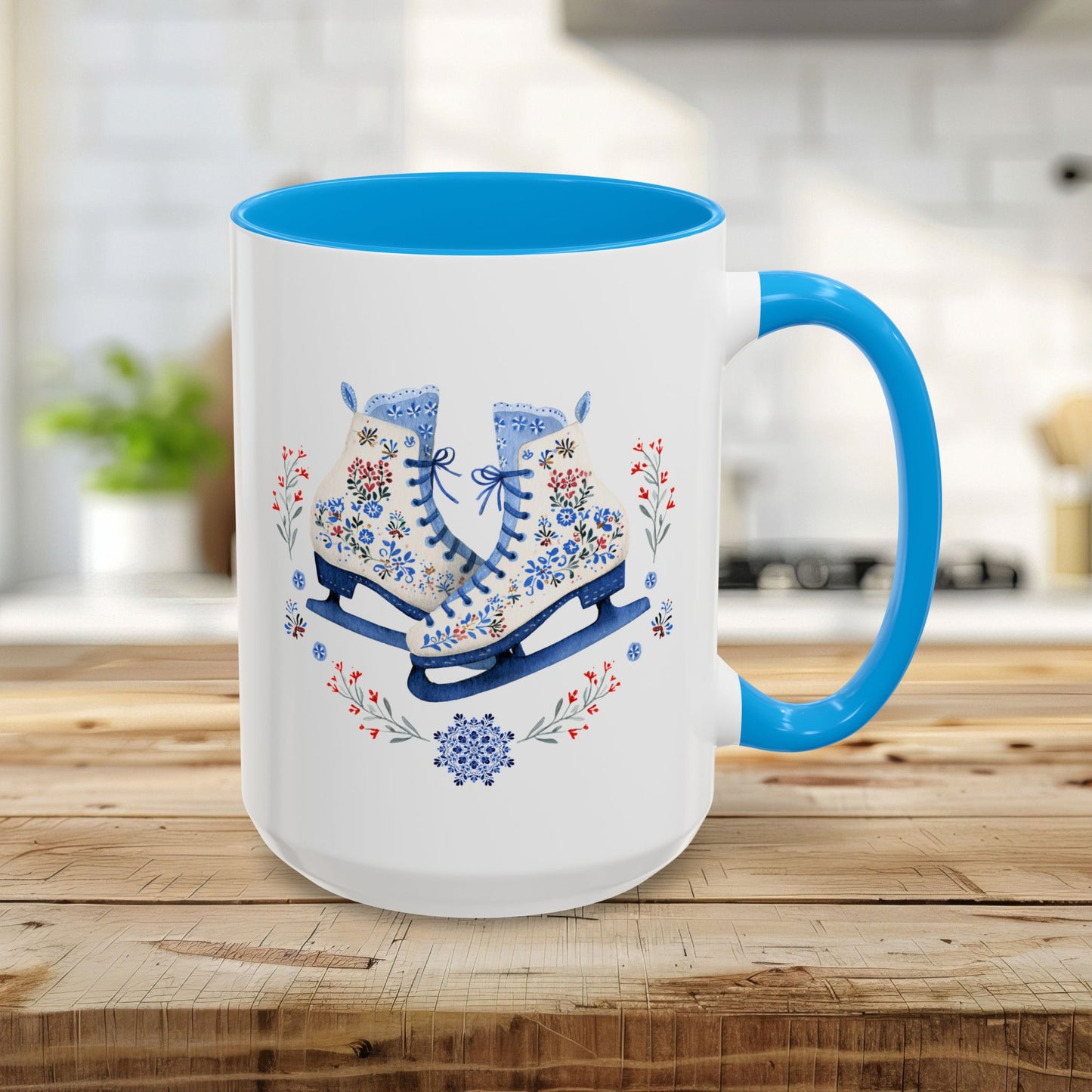 15oz white ceramic mug with light blue interior and handle, featuring folk art ice skates, snowflakes, and winter berries.