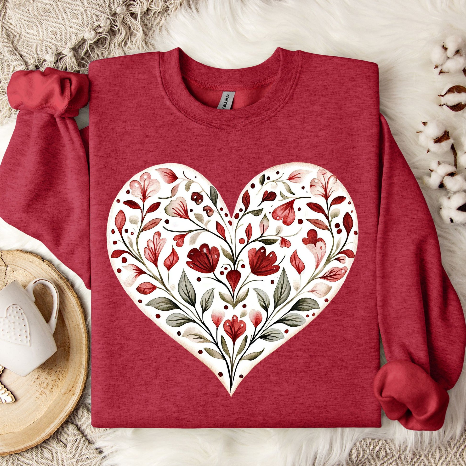 Antique Cherry Red S sweatshirt with a white heart filled with red floral folk art.