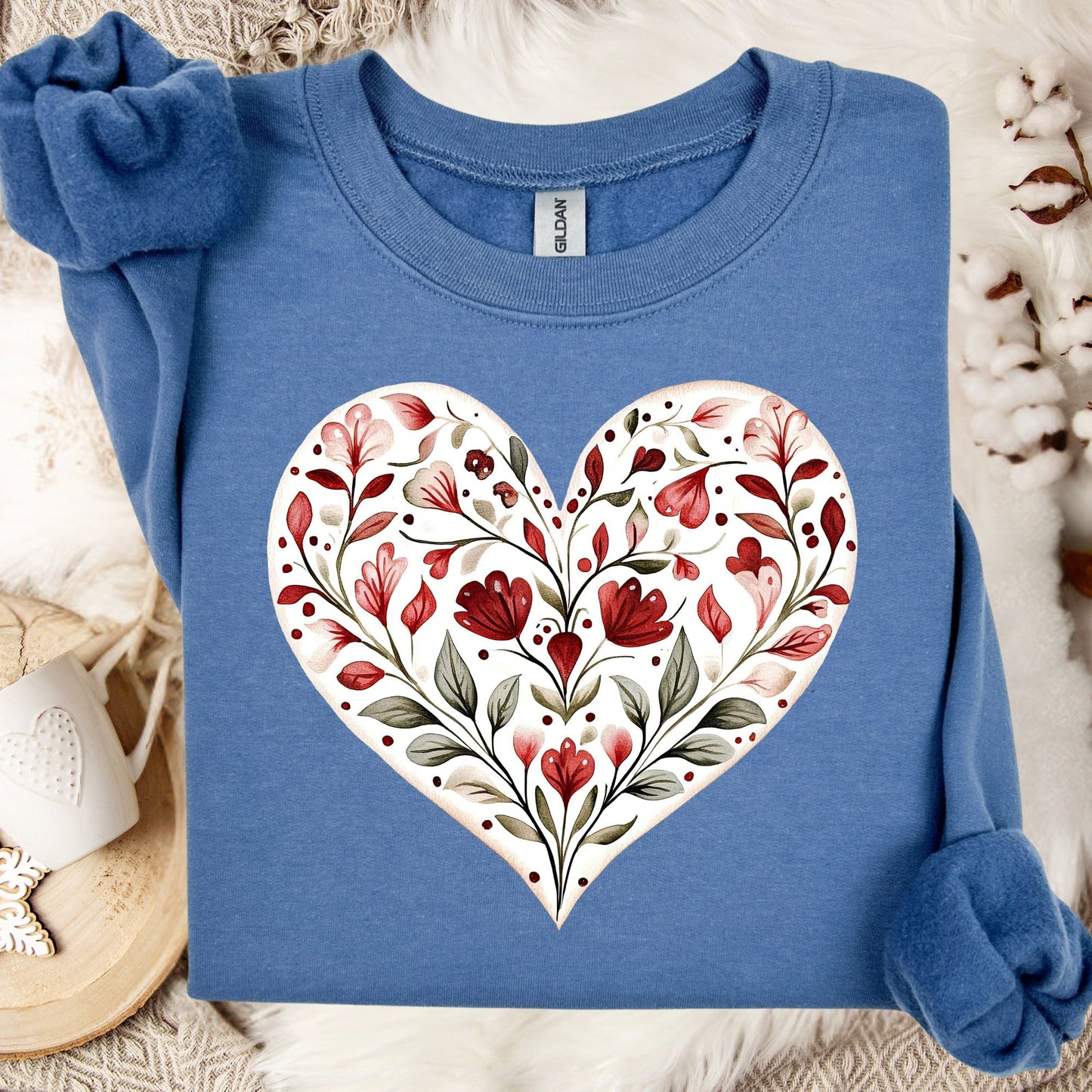 Indigo Blue S sweatshirt with a white heart filled with red floral folk art design.