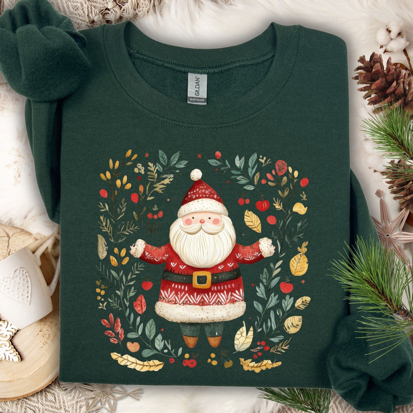 Forest Green S sweatshirt with folk art Santa in a wreath of evergreens, holly, and golden accents.