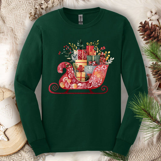 Forest green long sleeve tee with a folk art Old World Christmas sleigh brimming with festive gifts.