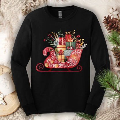 Black Gildan long sleeve tee with a folk art Old World Christmas sleigh design, brimming with festive gifts.