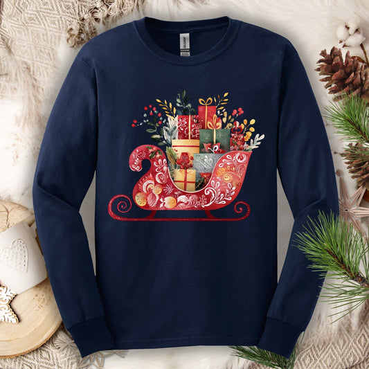 Navy long sleeve tee with a folk art red sleigh brimming with festive gifts in European hues.