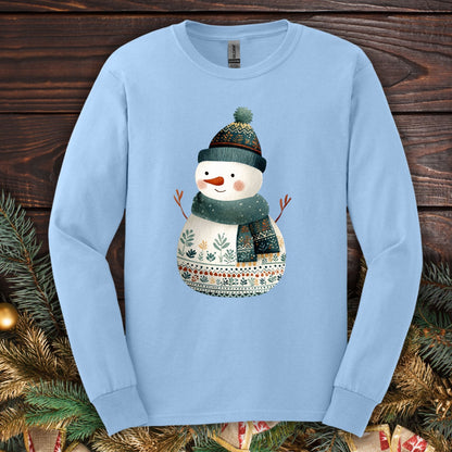 Light blue Gildan long sleeve tee with a folk art snowman in a teal hat and scarf.