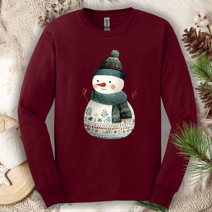 Maroon Gildan long sleeve tee with a folk art snowman in a teal hat and scarf.