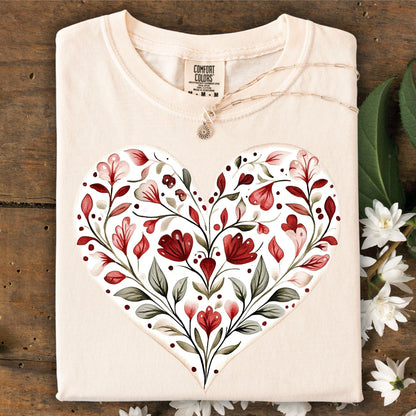 Ivory S t-shirt with a red floral heart design, made from 100% ring-spun cotton.