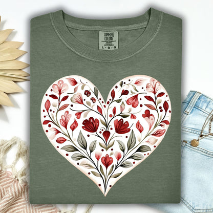Moss green relaxed-fit t-shirt with a large folk art red floral heart design.