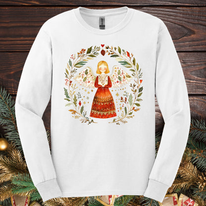 White Gildan Softstyle long sleeve tee with a folk art angel in a winter wreath design.