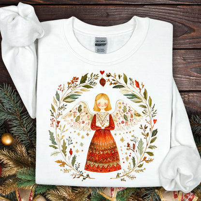 White Folk Art Winter Angel Sweatshirt with a detailed wreath design, perfect for meaningful holiday style.