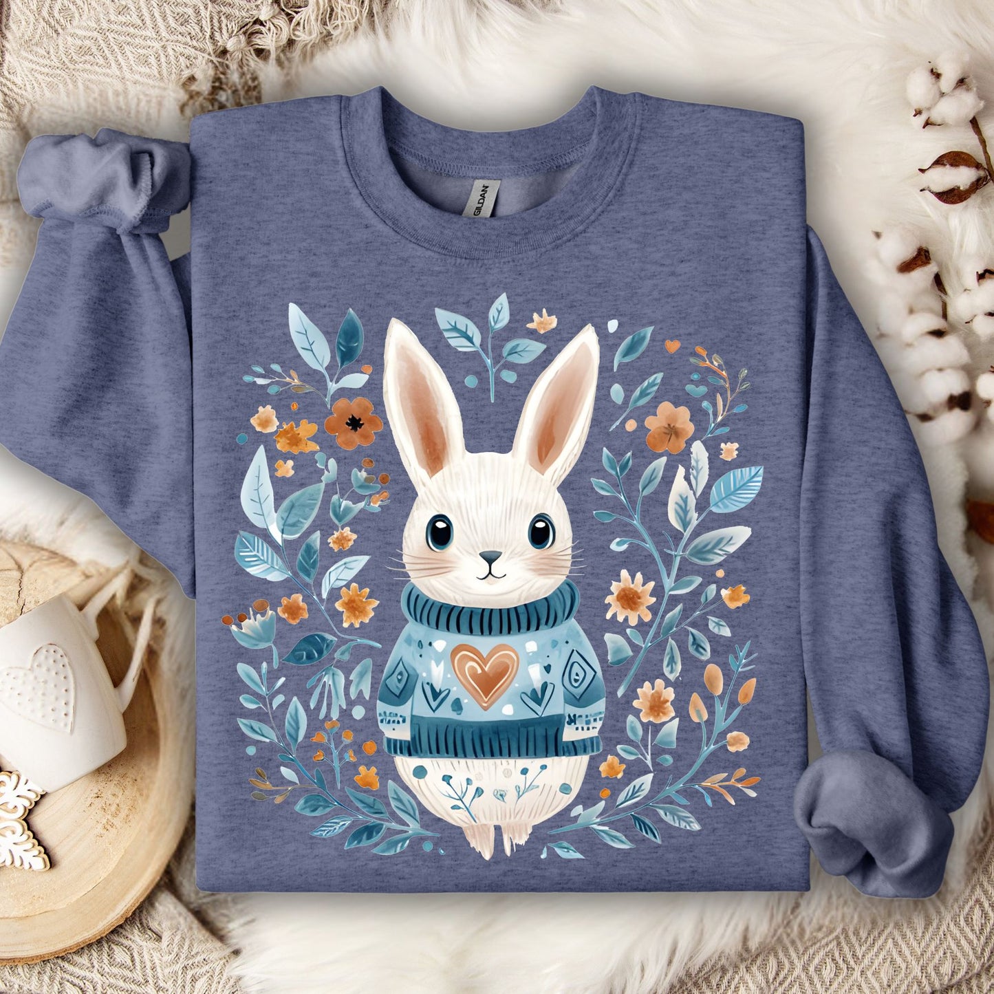 Heather Sport Dark Navy sweatshirt with a folk art bunny in a heart sweater, surrounded by floral designs.