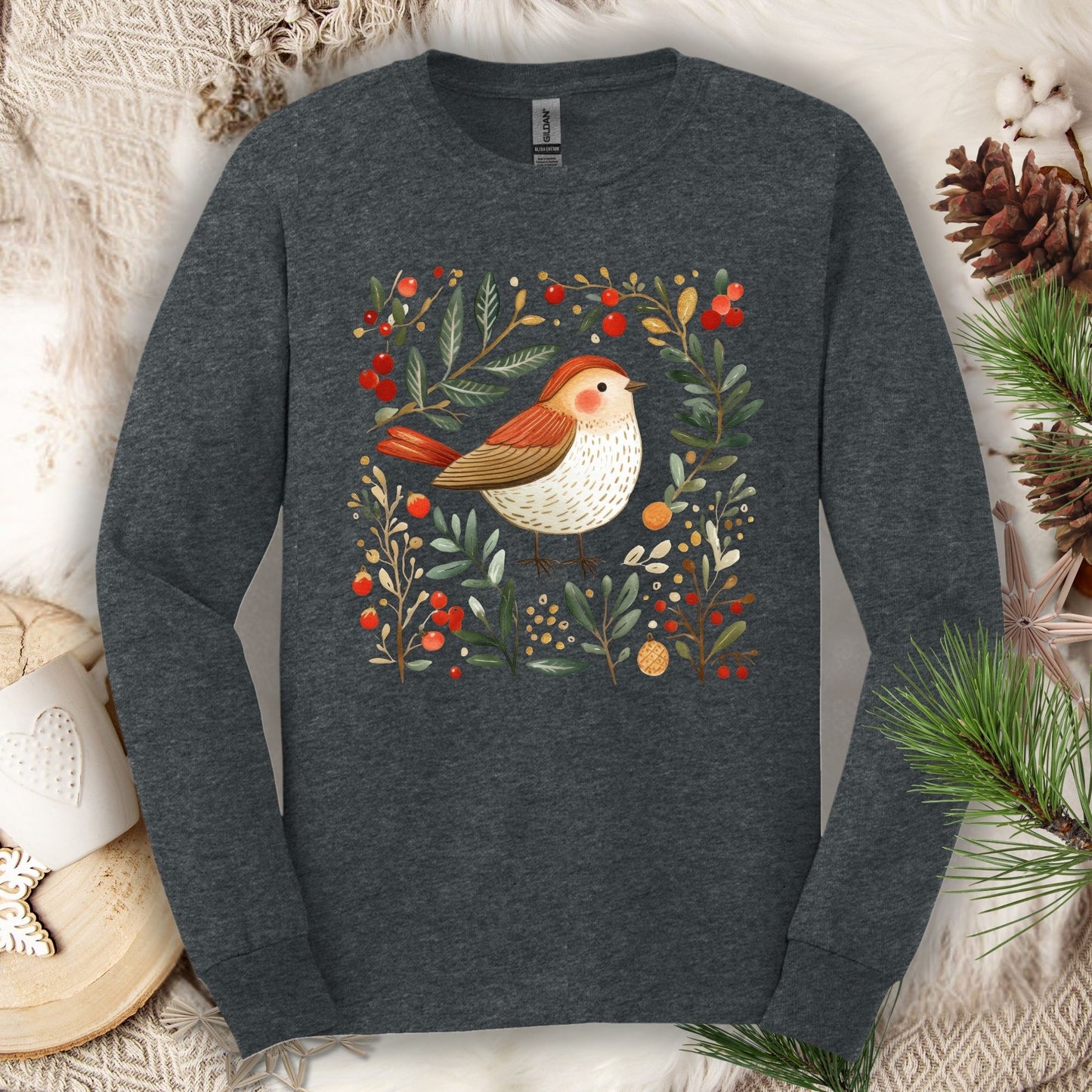 Dark Heather Gildan Softstyle long sleeve tee with folk art winter sparrow, evergreens, holly, and ornaments.