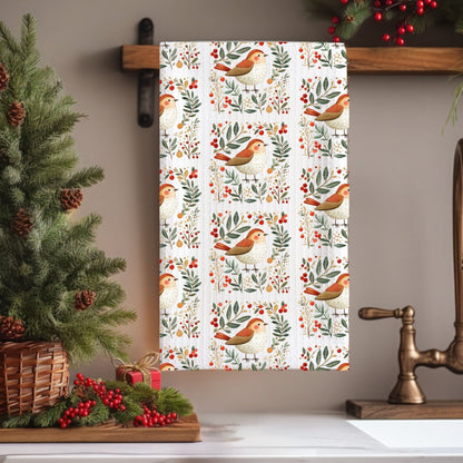 Folk art winter sparrow microfiber tea towel with watercolor sparrows, holly berries, and leaves.