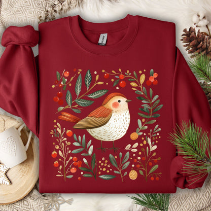 Cardinal Red fleece sweatshirt with folk art sparrow, evergreens, holly, and Christmas ornaments.