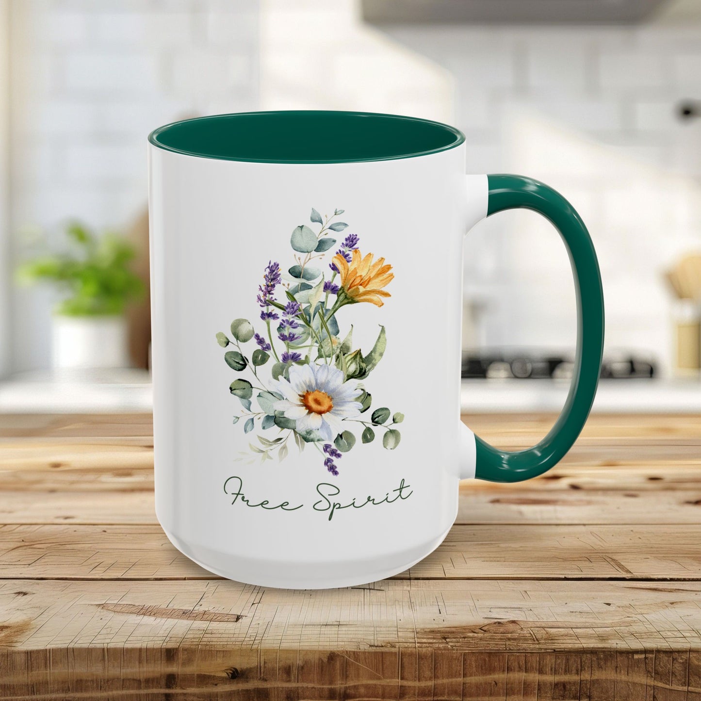 15oz white ceramic mug with green handle and interior, featuring watercolor wildflowers and "Free Spirit" script.