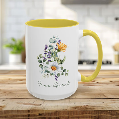 15oz ceramic mug with yellow handle/interior, watercolor wildflowers, eucalyptus, and "Free Spirit" script.