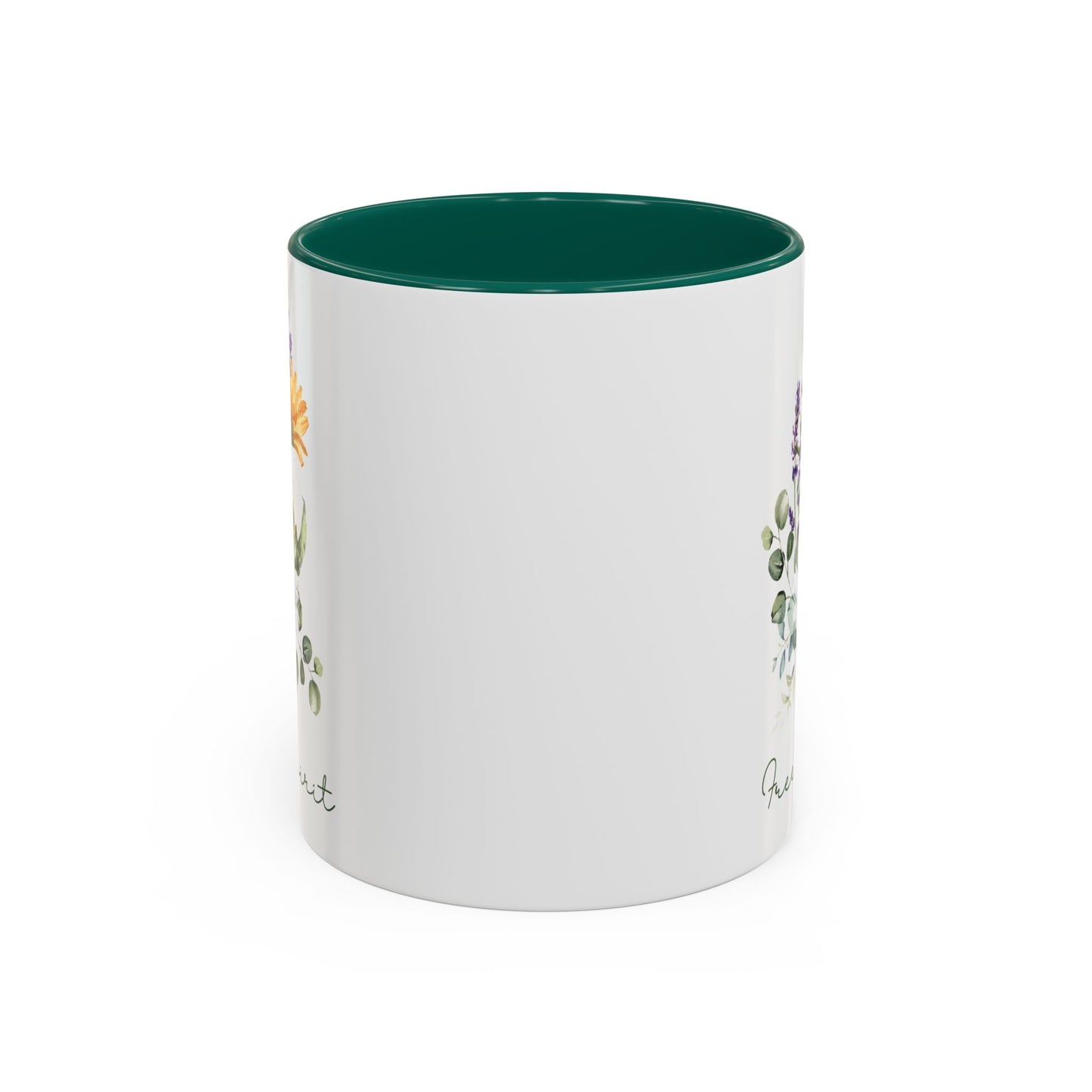 White ceramic mug with a dark green interior and handle, featuring watercolor wildflowers and "Free Spirit" script.