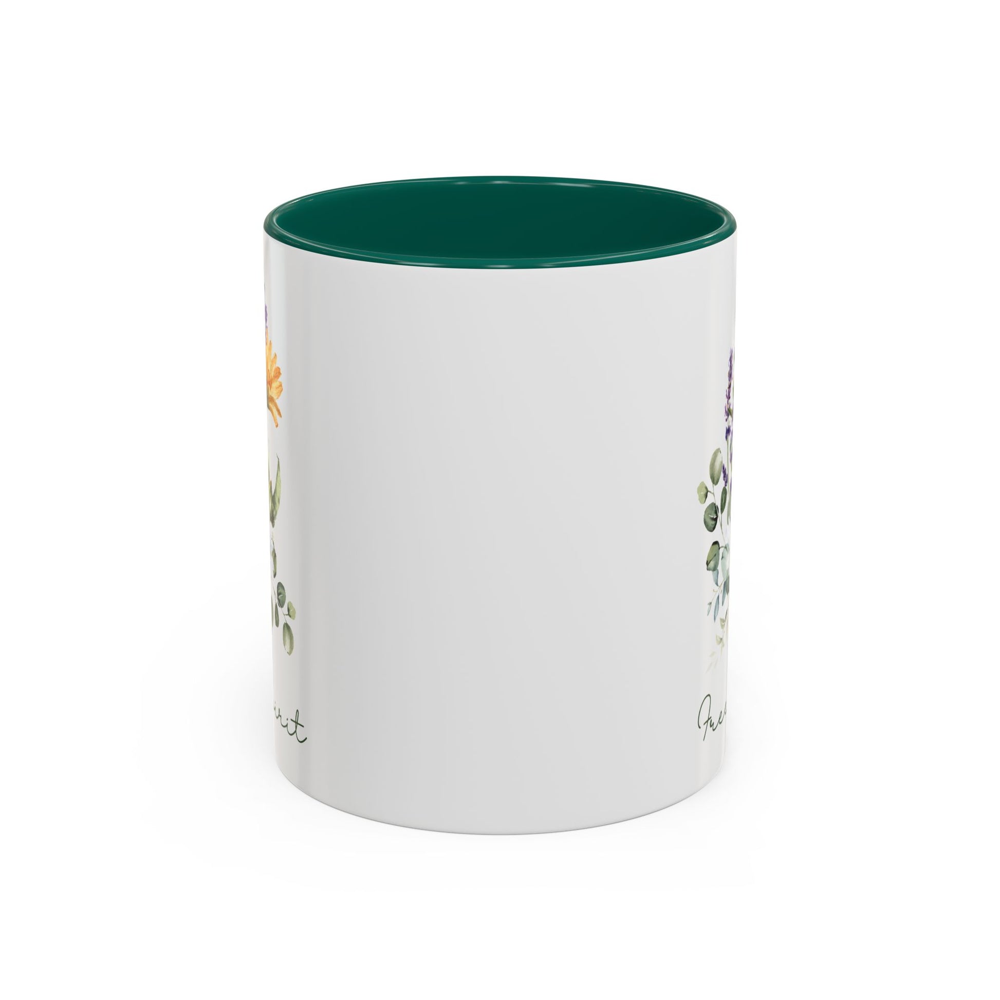 White ceramic mug with a dark green interior and handle, featuring watercolor wildflowers and "Free Spirit" script.