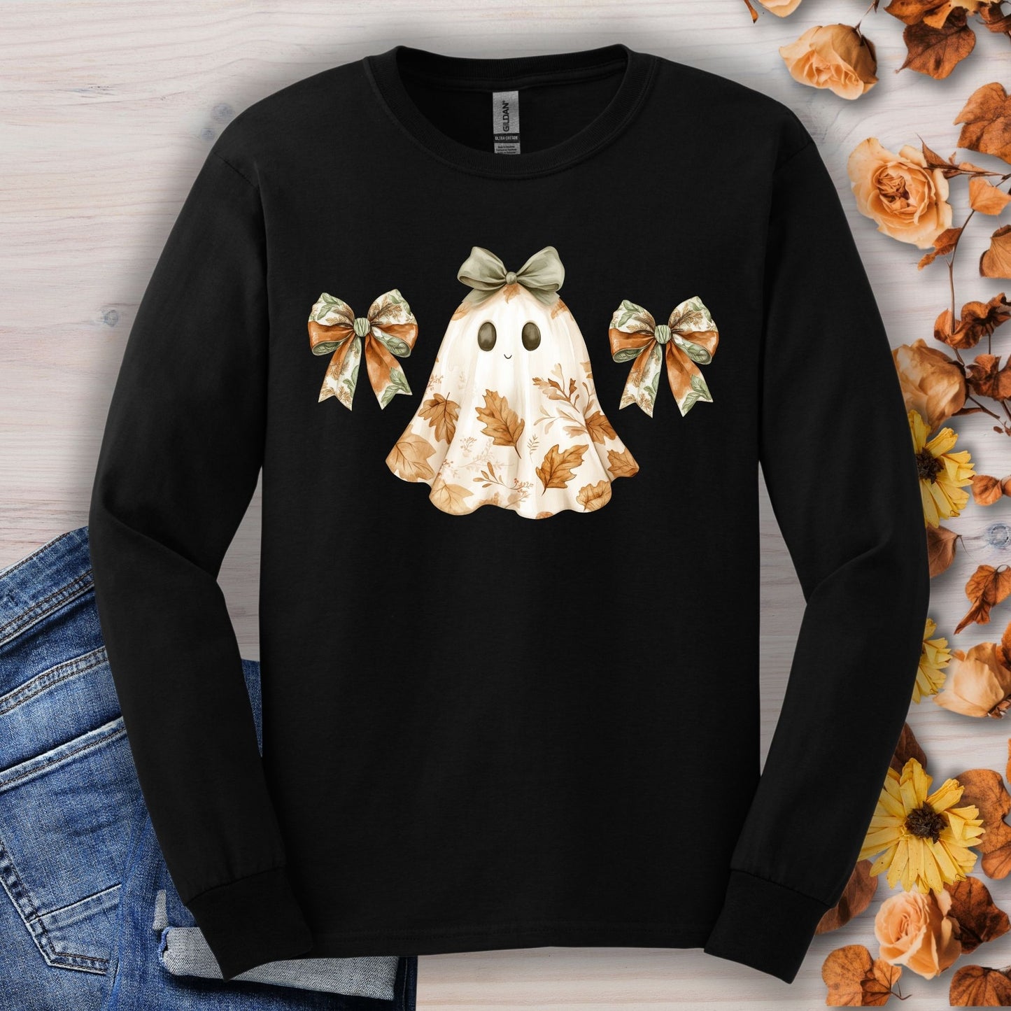 Black long sleeve t-shirt with a friendly boho ghost, fall leaves, and autumn bows.