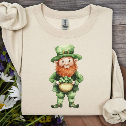Sand unisex sweatshirt with a friendly leprechaun holding a pot of clovers, perfect for St. Patrick's Day.