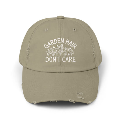 Light olive distressed cotton twill cap with "Garden Hair Don't Care" text and floral design.