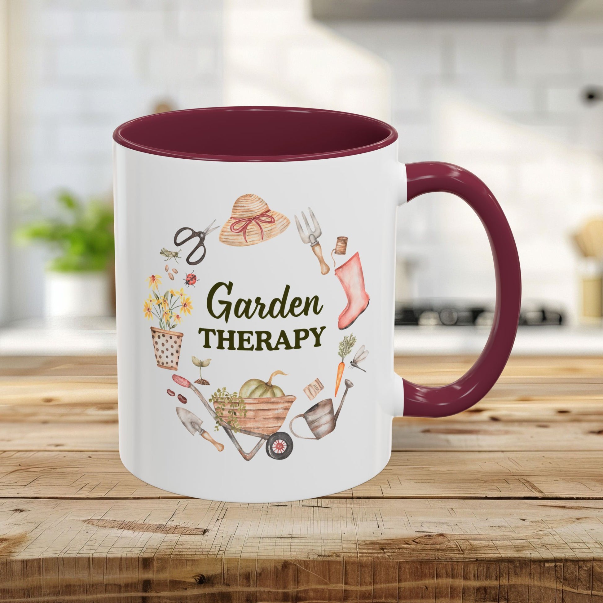 11oz ceramic mug with maroon interior/handle and "Garden Therapy" wreath design.