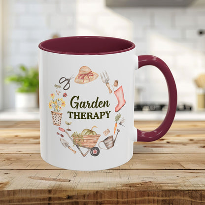 11oz ceramic mug with maroon interior/handle and "Garden Therapy" wreath design.