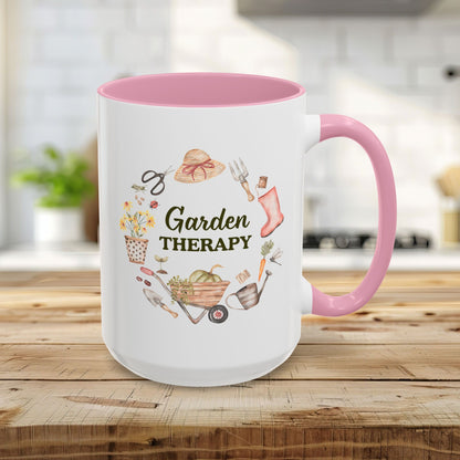 15oz white ceramic mug with pink handle and interior, featuring "Garden Therapy" surrounded by watercolor garden tools.