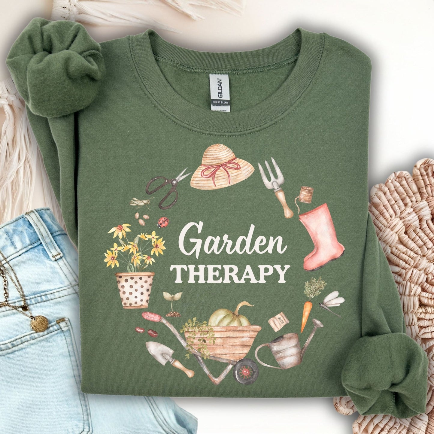 Military Green Garden Therapy sweatshirt with a floral wreath design of gardening tools and plants.