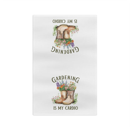White microfiber tea towel with watercolor garden boots overflowing with colorful flowers and "Gardening Is My Cardio" text.