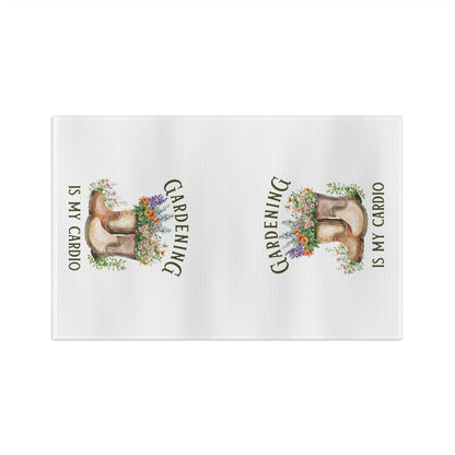 White microfiber tea towel with "Gardening Is My Cardio" text and watercolor boots overflowing with colorful flowers.