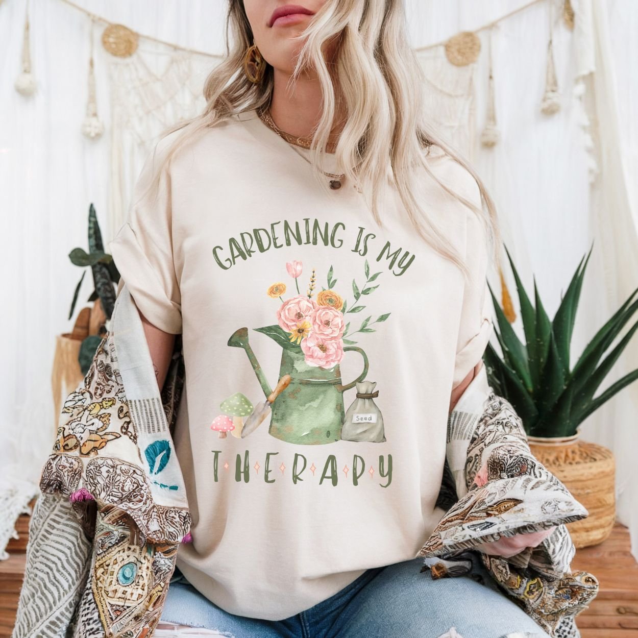 Beige cotton t-shirt with "Gardening Is My Therapy" text and a watercolor watering can with flowers.