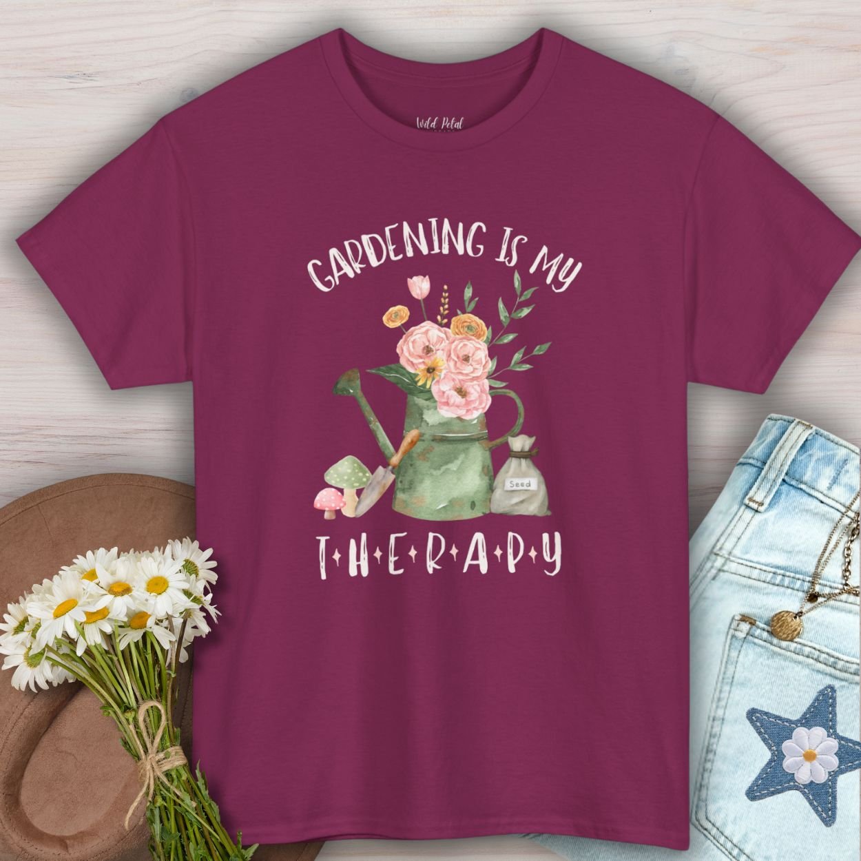 Berry S-size cotton t-shirt with "Gardening Is My Therapy" watercolor design featuring a watering can, flowers, and mushrooms.