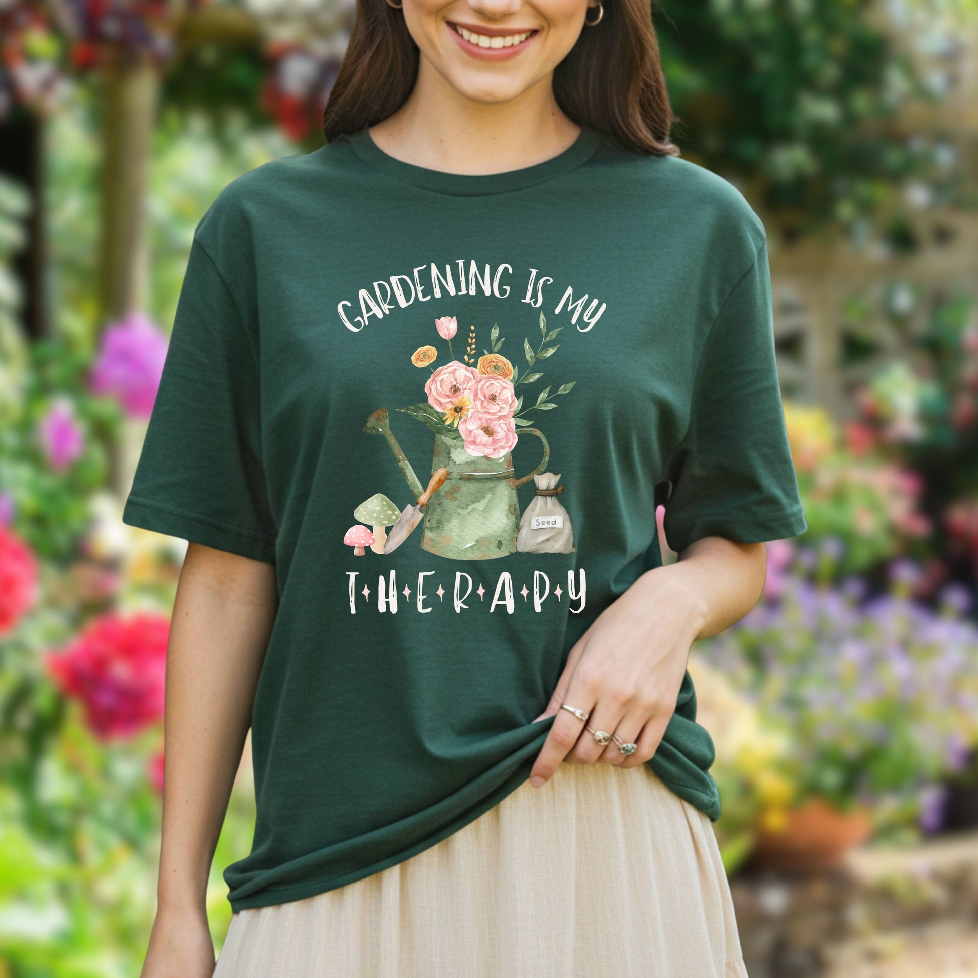 young woman wearing a green t-shirt with 'Gardening is my therapy' design in a garden setting