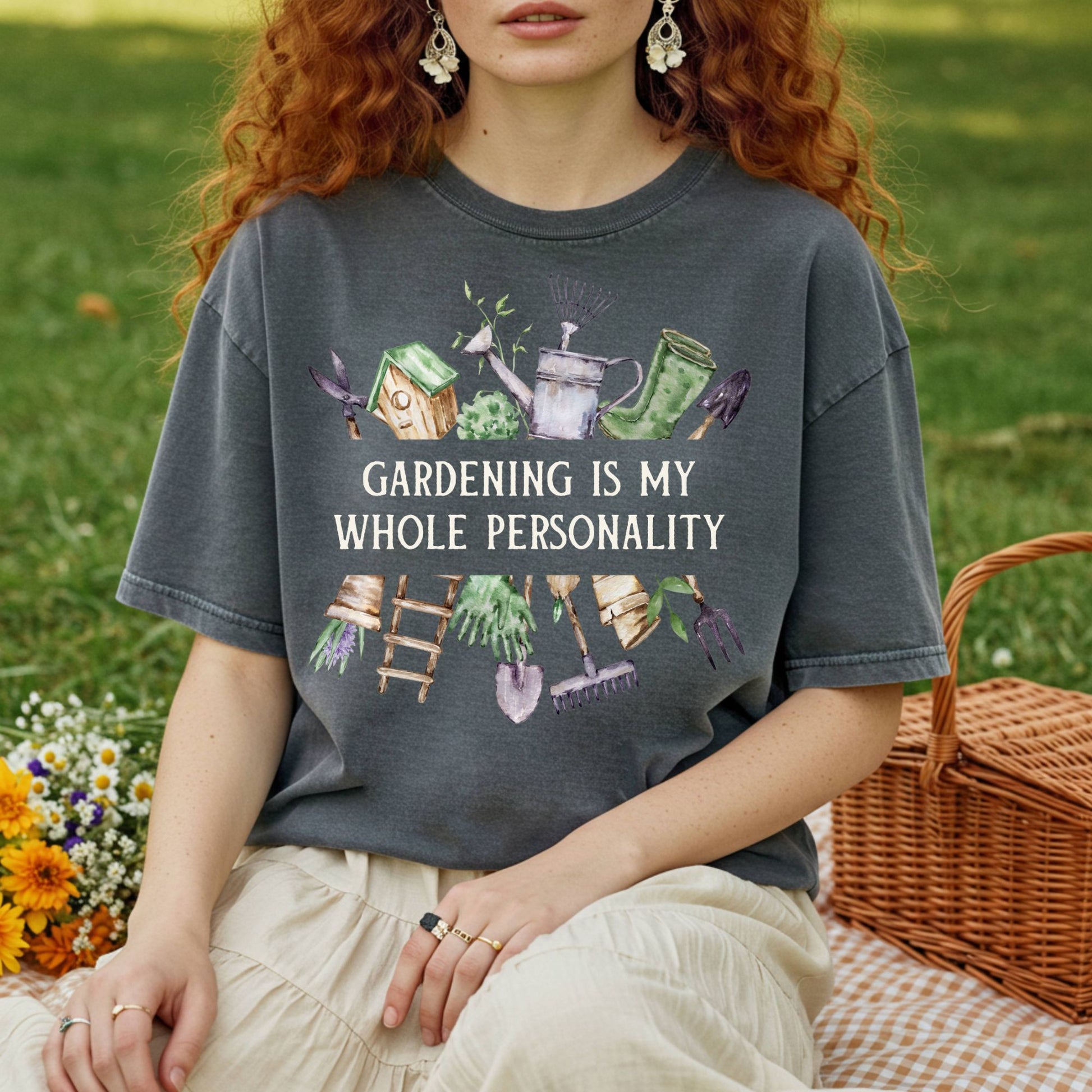 Charcoal t-shirt with "Gardening Is My Whole Personality" text and watercolor gardening tools/florals.