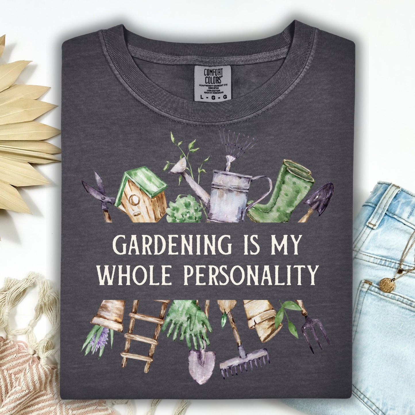 Pepper Comfort Colors t-shirt with "Gardening Is My Whole Personality" and watercolor tools/florals.