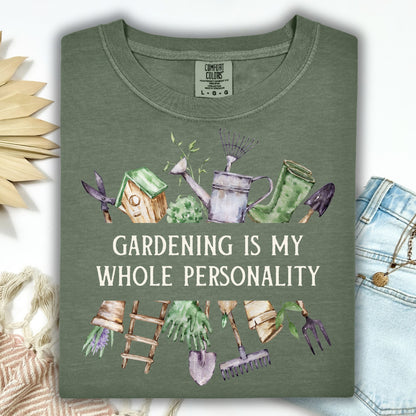 Moss green Comfort Colors t-shirt with "Gardening Is My Whole Personality" and watercolor garden tools.