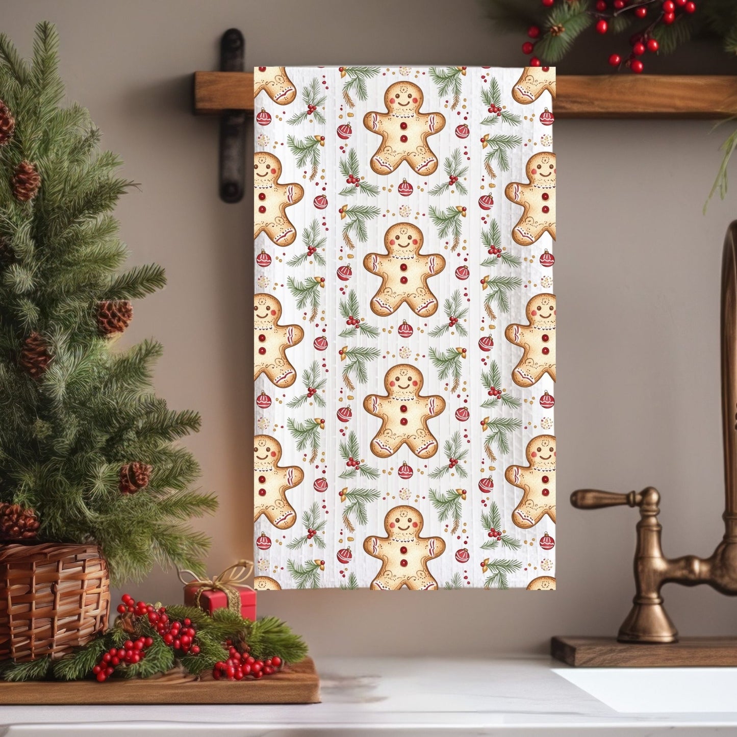 Microfiber tea towel with a repeating gingerbread cookie and holly pattern, hanging in a festive kitchen.