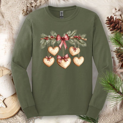 Military Green long sleeve tee with a watercolor gingerbread heart garland design.
