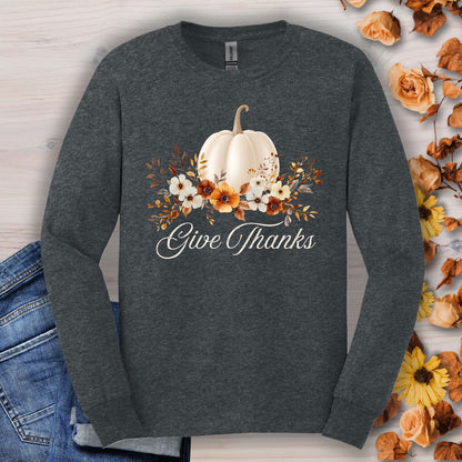 Dark Heather Gildan long sleeve tee, size S, with a watercolor white pumpkin, autumn foliage, and "Give Thanks" text.
