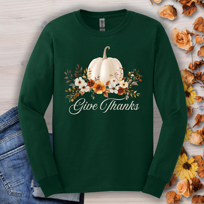 Forest Green Gildan long sleeve tee with a watercolor white pumpkin, autumn foliage, and "Give Thanks" text.