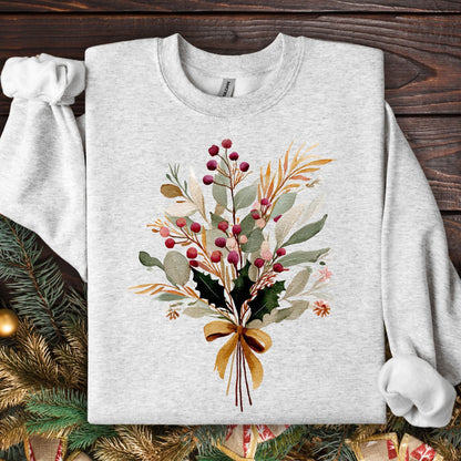 Ash S sweatshirt with a watercolor Christmas bouquet tied with a golden bow.