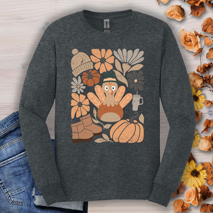 Dark Heather S long sleeve tee with a "Groovy Turkey" graphic surrounded by fall essentials.