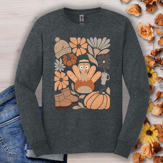 Dark Heather S long sleeve tee with a "Groovy Turkey" graphic surrounded by fall essentials.