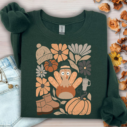 Forest Green Gildan 18000 sweatshirt with a groovy turkey, fall leaves, boots, and florals design.
