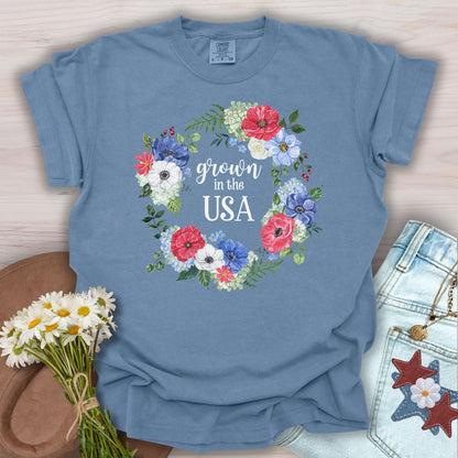 Blue Jean "Grown in the USA" t-shirt with a watercolor floral wreath design.