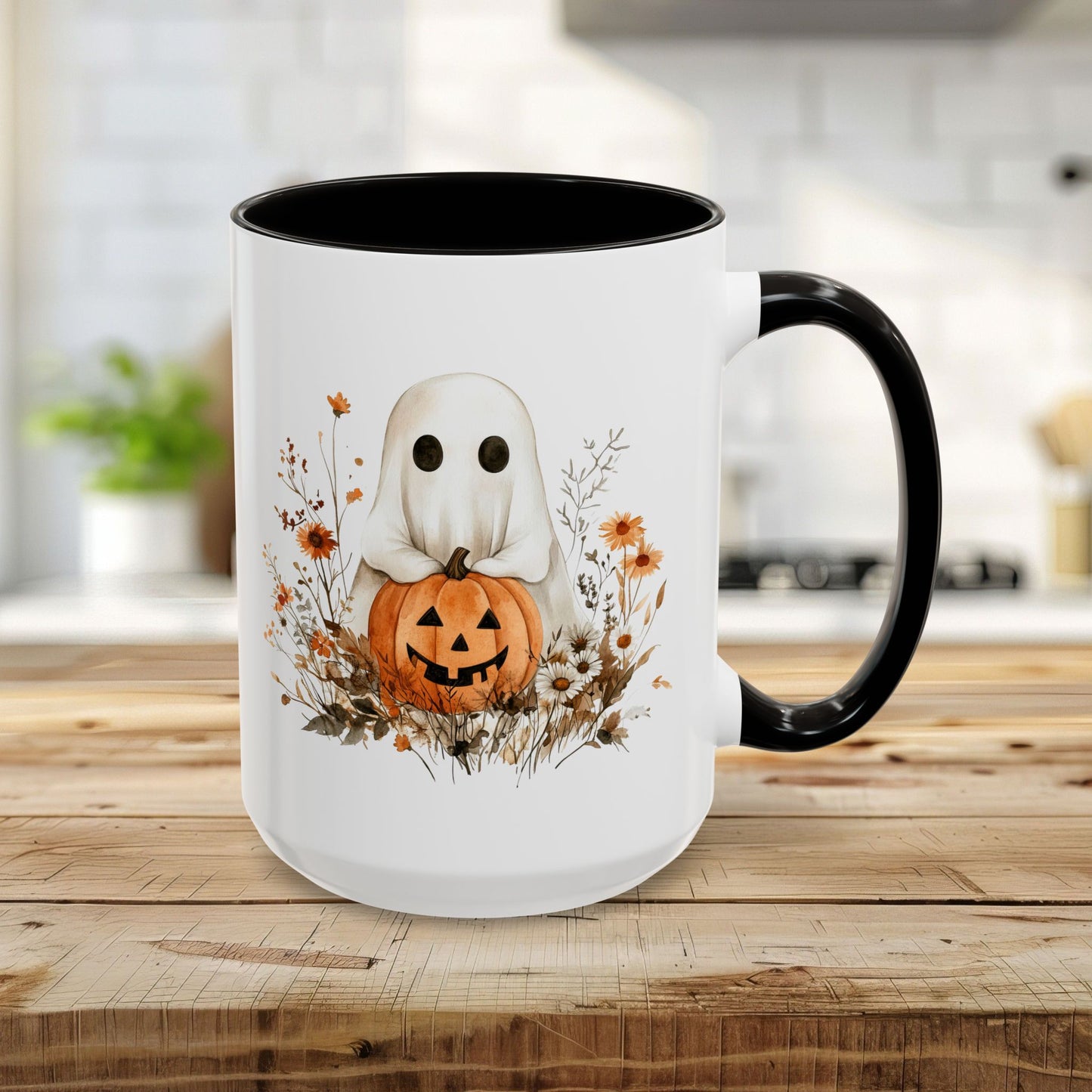 15oz white ceramic mug with black handle, featuring a watercolor ghost holding a jack-o'-lantern amidst wildflowers.