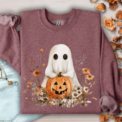 Heather Sport Dark Maroon sweatshirt with a cute ghost holding a jack o'lantern, surrounded by autumn wildflowers.