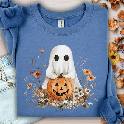 Indigo Blue Halloween Boho Ghost sweatshirt with a cute ghost holding a Jack O'Lantern, surrounded by autumn wildflowers.